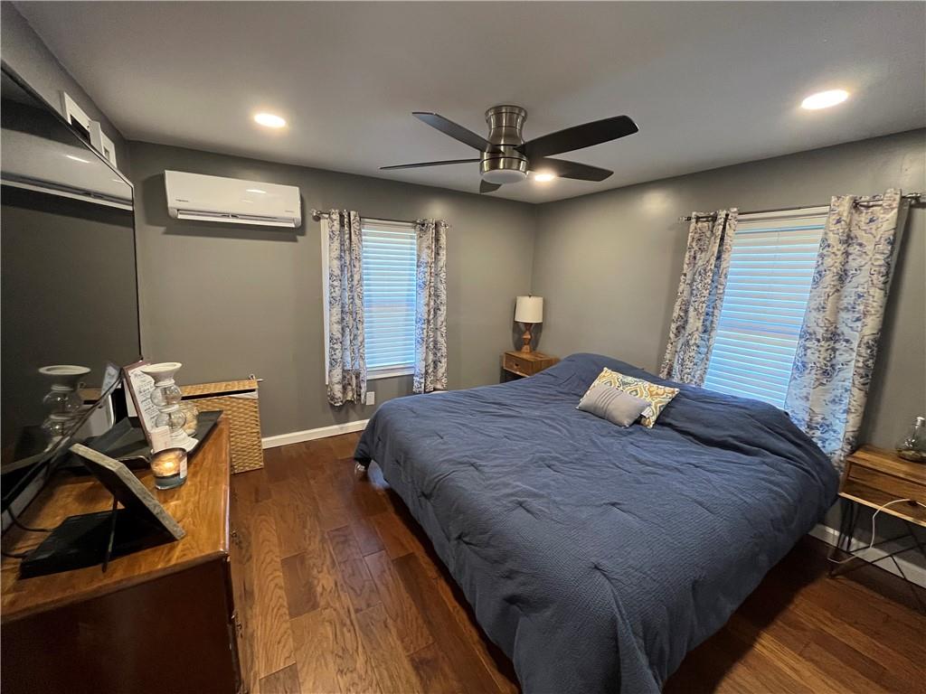 683 10 Mile Road Amity, PA 15311 - Photo 14 of 16 a bed sitting in a room next to a window