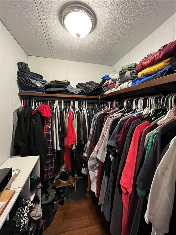 683 10 Mile Road Amity, PA 15311 - Photo 15 of 16 a view of walk in closet with clothes and shoes