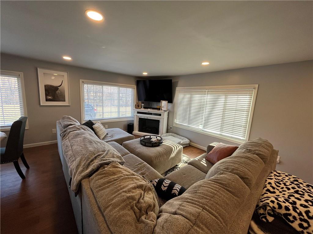 683 10 Mile Road Amity, PA 15311 - Photo 8 of 16 a living room with furniture and a flat screen tv