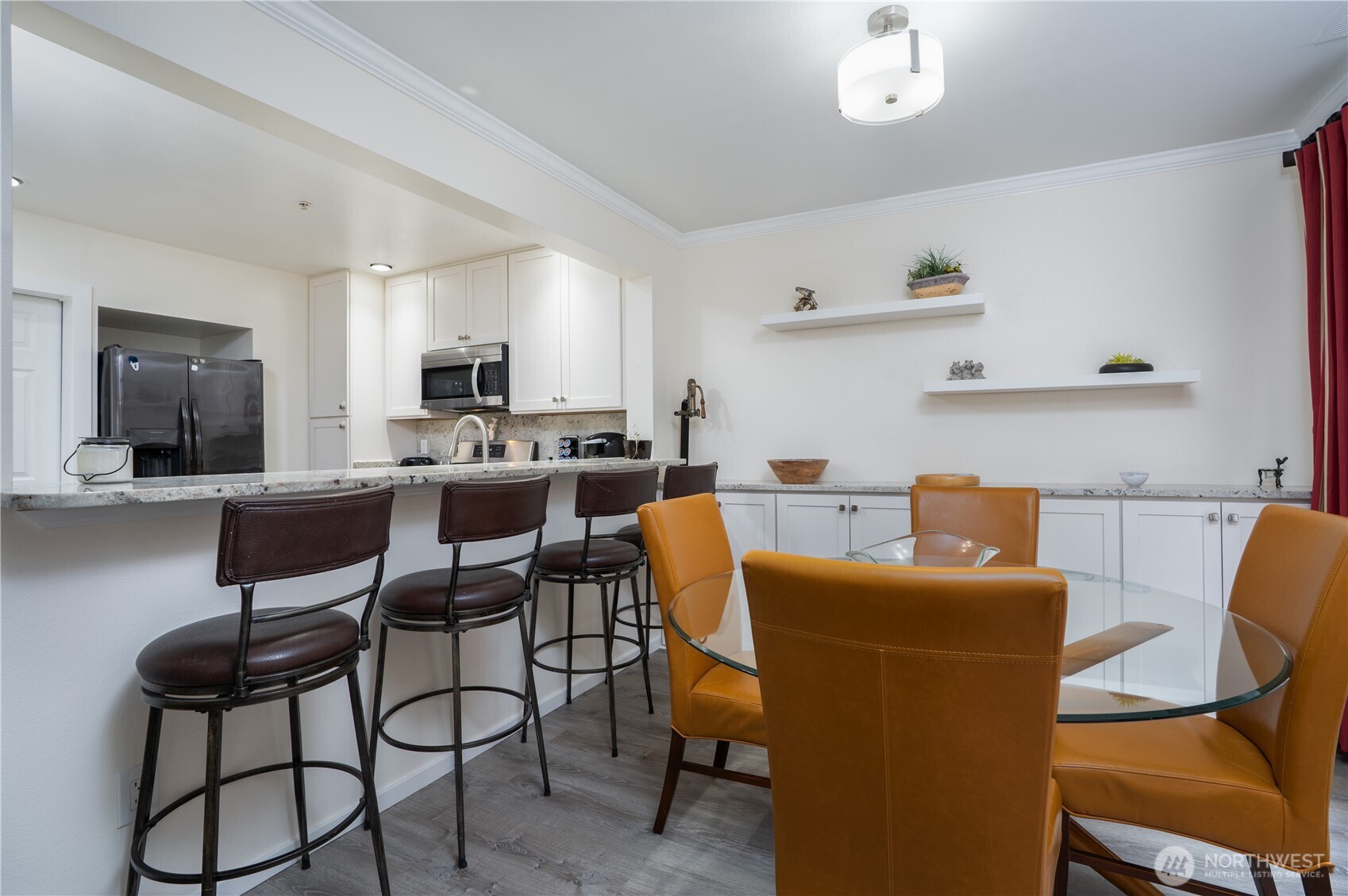 1971 South 368th Place, Unit 902 Federal Way, WA 98003 - Photo 12 of 39 a dining room with furniture and window