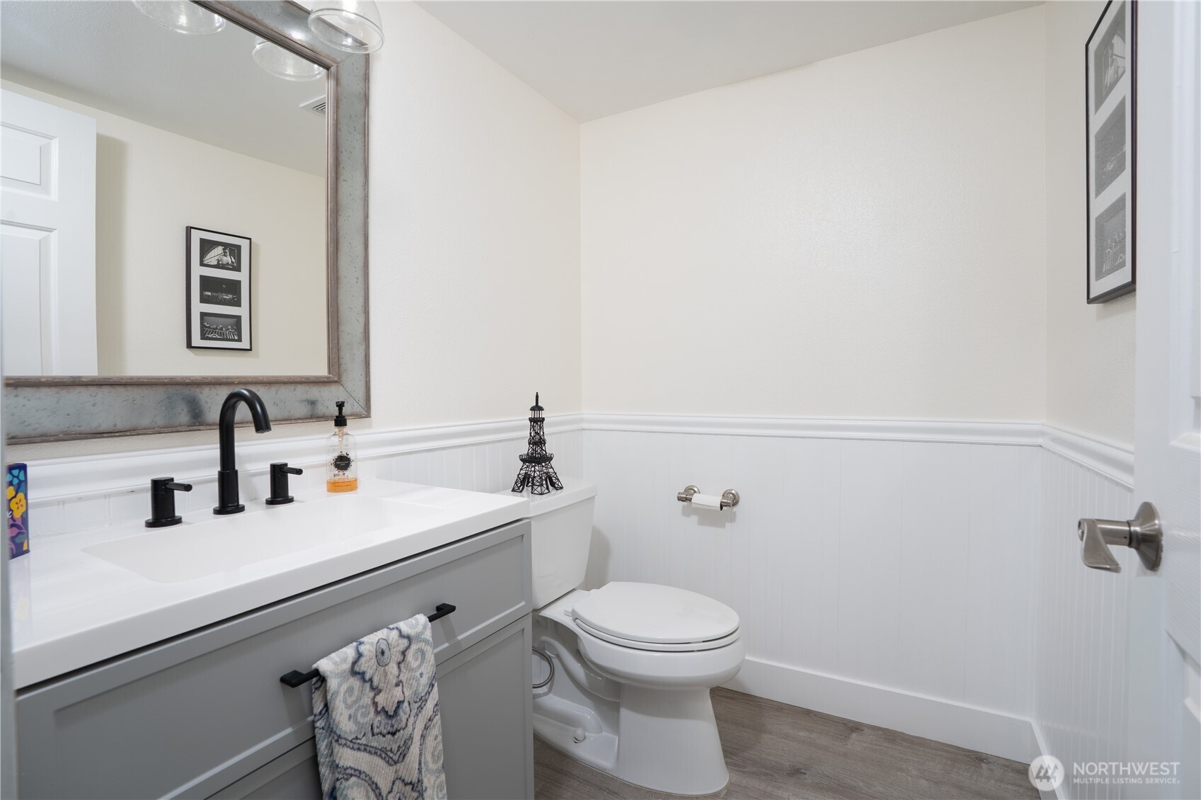 1971 South 368th Place, Unit 902 Federal Way, WA 98003 - Photo 14 of 39 a bathroom with a toilet a sink and mirror