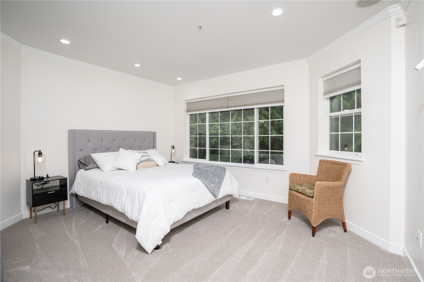 1971 South 368th Place, Unit 902 Federal Way, WA 98003 - Photo 19 of 39 a large bed sitting in a room next to a large window