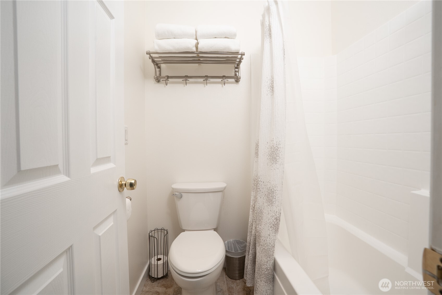 1971 South 368th Place, Unit 902 Federal Way, WA 98003 - Photo 22 of 39 a white toilet sitting next to a bath tub