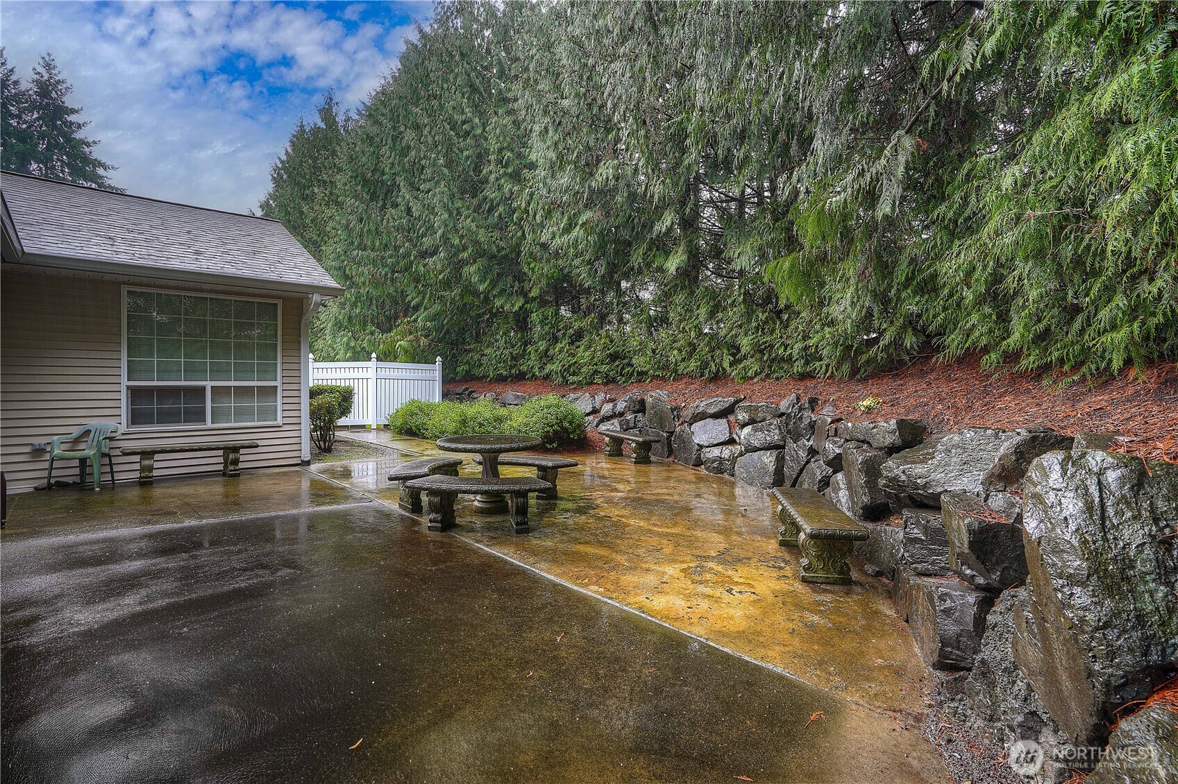 1971 South 368th Place, Unit 902 Federal Way, WA 98003 - Photo 36 of 39 a view of swimming pool with outdoor seating and plants