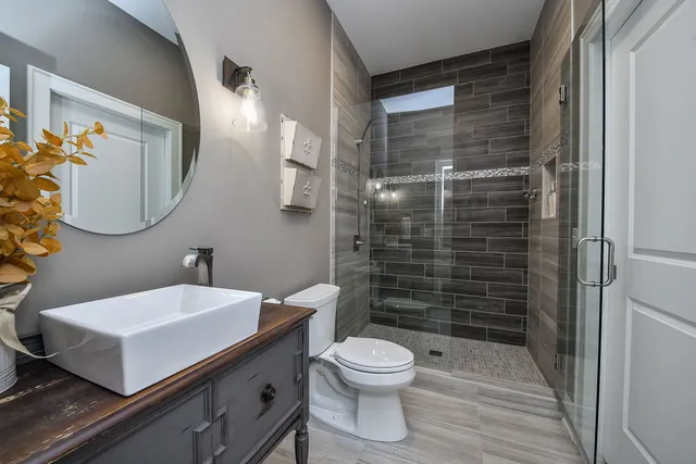 a bathroom with a sink and a window