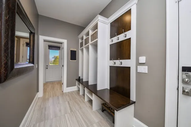 a bedroom with a bed and a flat screen television