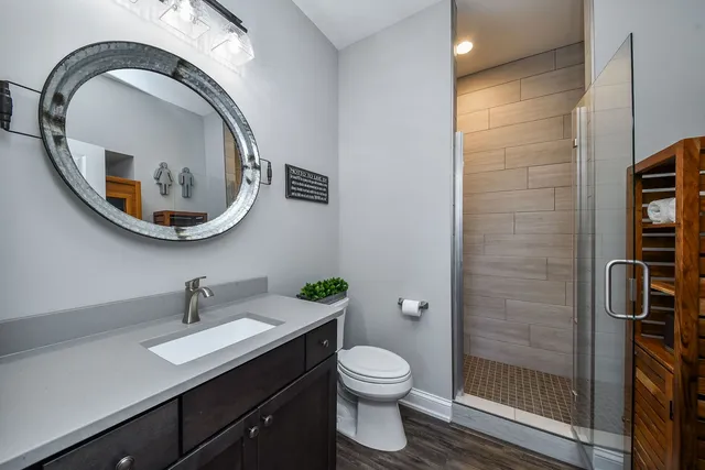 a view of a house with swimming pool and sitting area