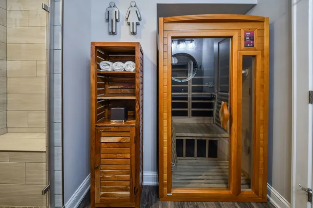 an aerial view of a house with swimming pool garden and patio