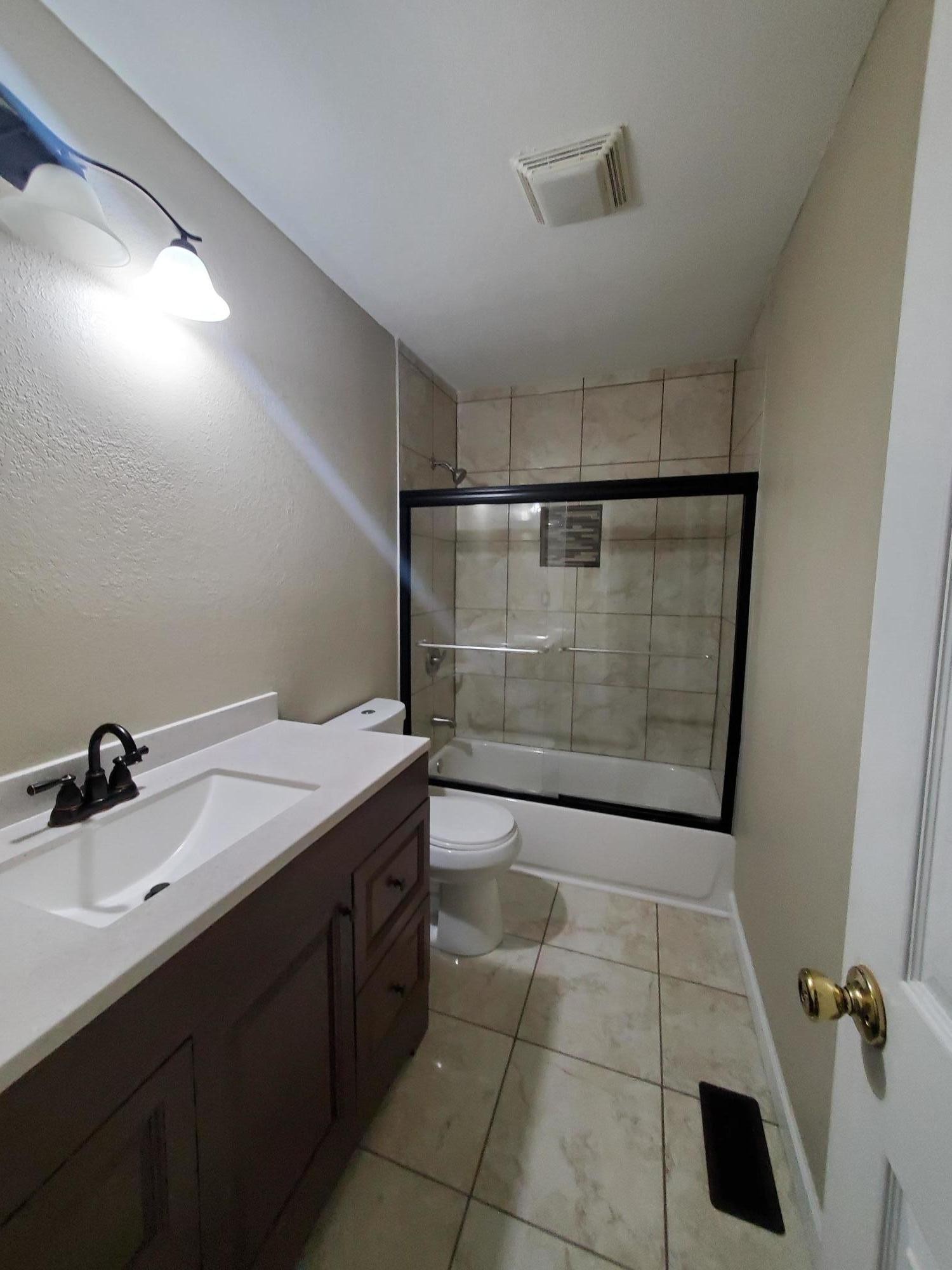 3227 Lineback Road Northwest Knoxville, TN 37921 - Photo 6 of 9 a bathroom with a sink a toilet and shower