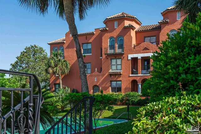 front view of a house with a small yard