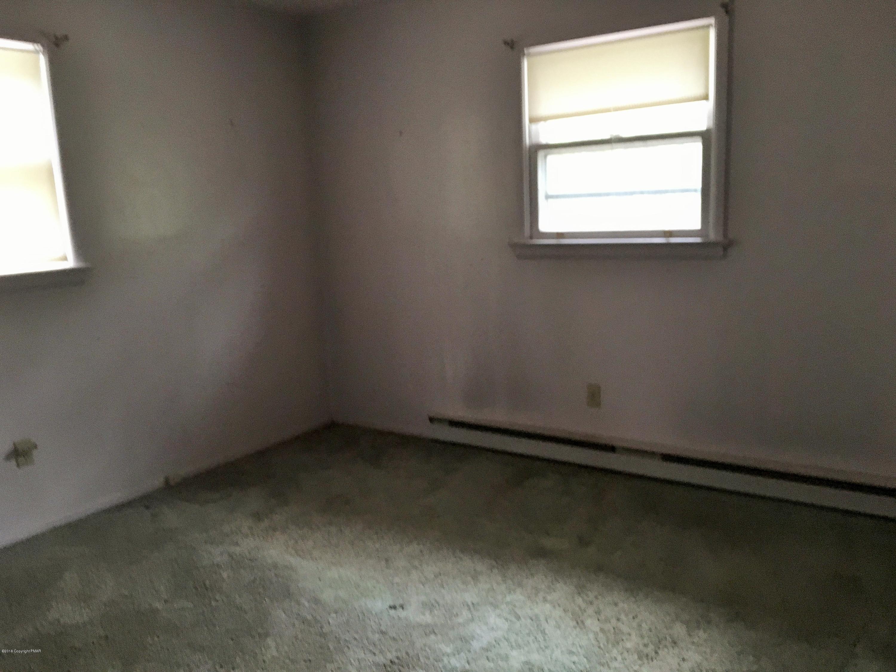 3224 Red Run Road Pocono Summit, PA 18346 - Photo 8 of 11 an empty room with a window