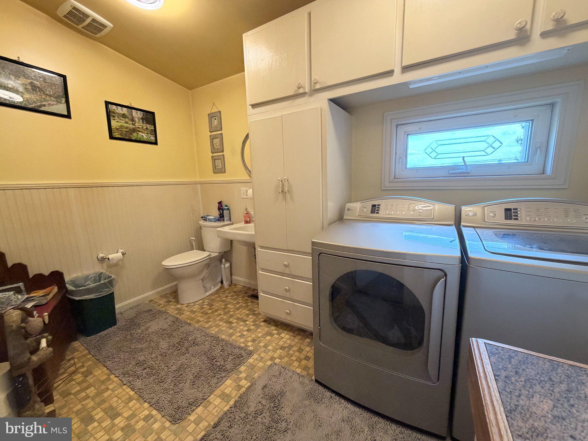 8810 Rowe Run Road Shippensburg, PA 17257 - Photo 21 of 38 Half bath and main floor laundry in addition