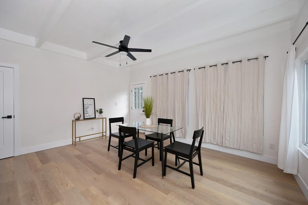 2316 West Swain Road Stockton, CA 95207 - Photo 28 of 46 a view of a dining room with furniture and window