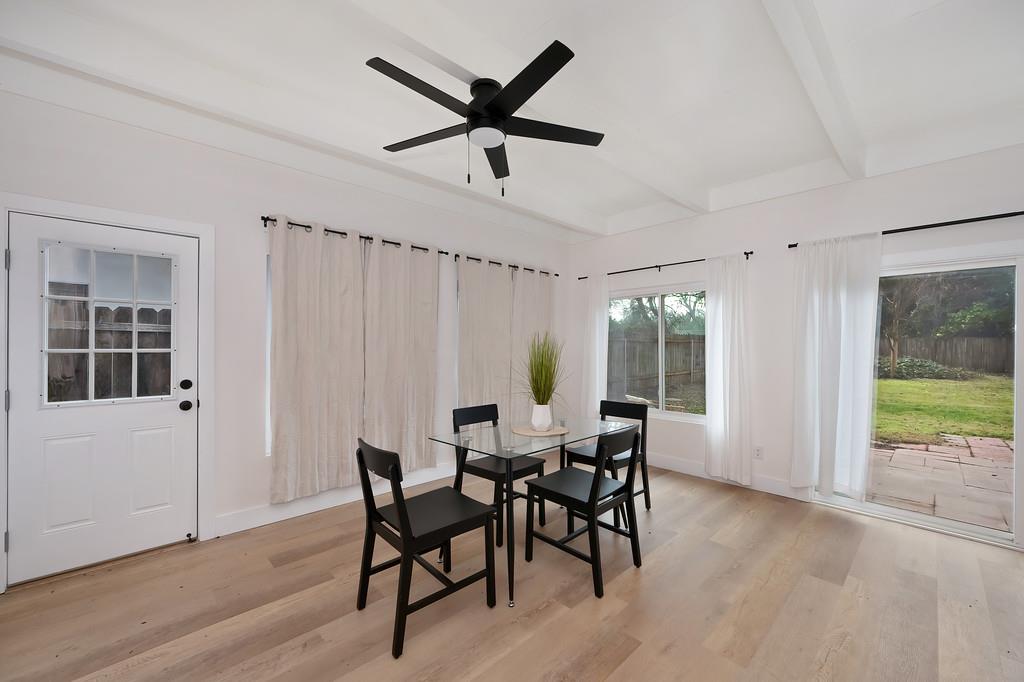2316 West Swain Road Stockton, CA 95207 - Photo 29 of 46 a view of a dining room with furniture and window
