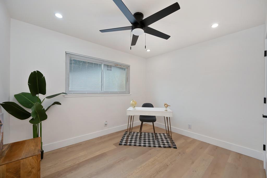 2316 West Swain Road Stockton, CA 95207 - Photo 35 of 46 a view of workspace with wooden floor
