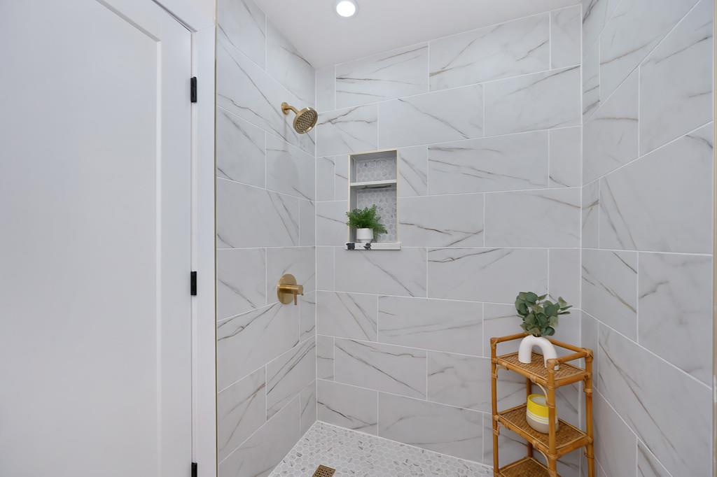 2316 West Swain Road Stockton, CA 95207 - Photo 38 of 46 a bathroom with a shower