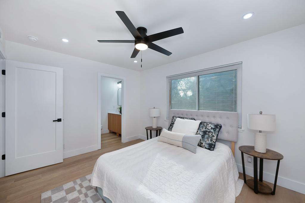 2316 West Swain Road Stockton, CA 95207 - Photo 39 of 46 a bedroom with a bed and window