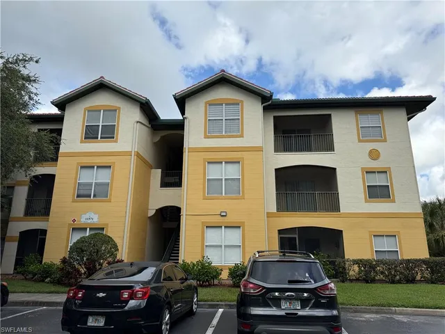 a car parked in front of a house