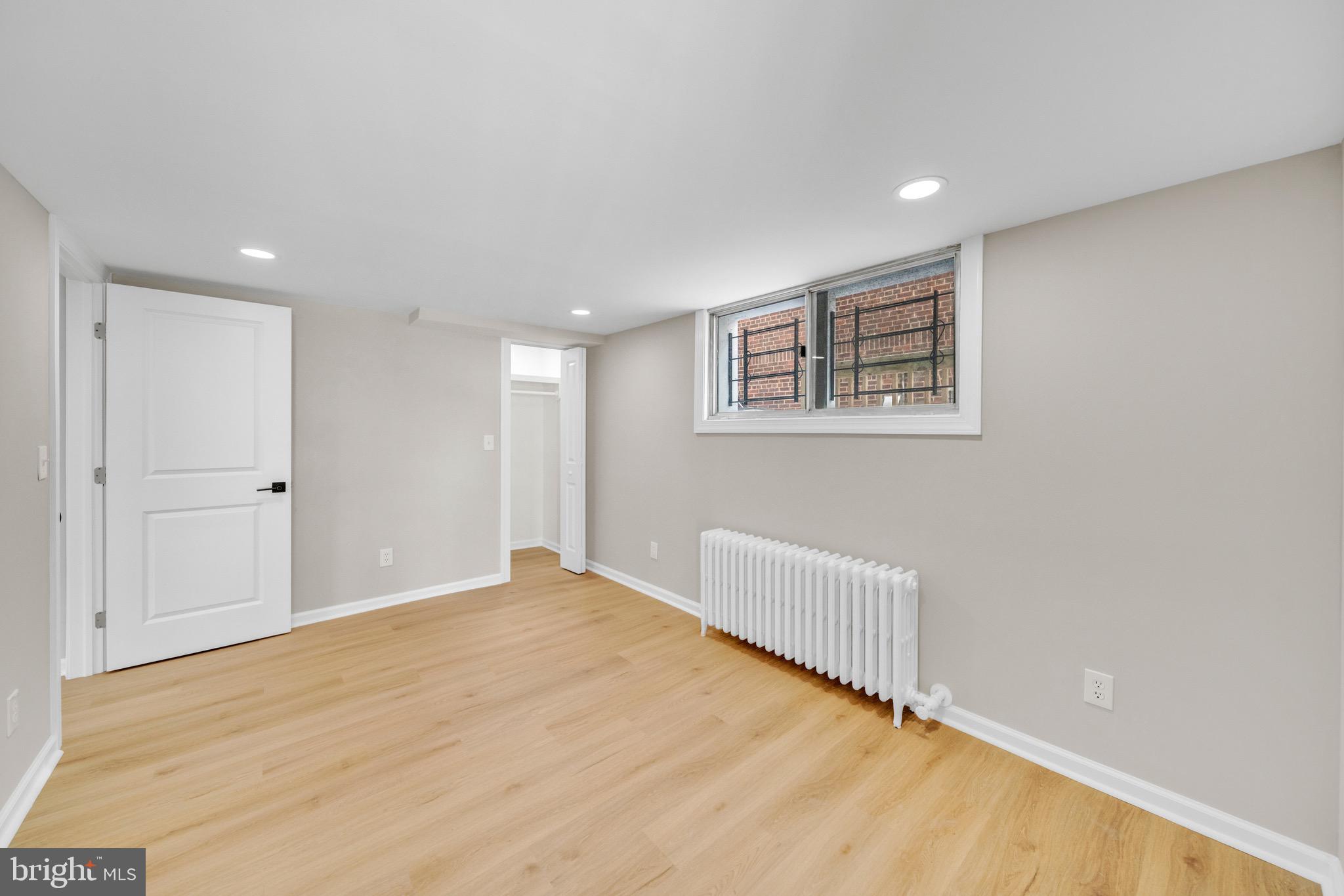 6018 2nd Street Northwest Washington, DC 20011 - Photo 15 of 18 a view of an empty room with a window