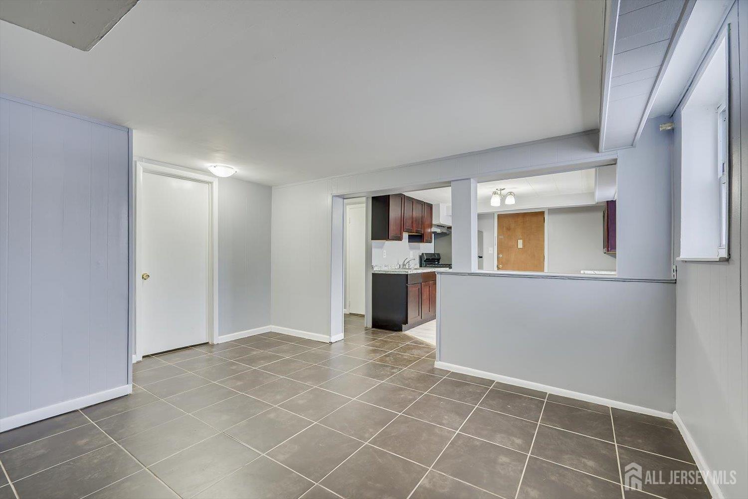 2 Garfield Park Edison, NJ 08837 - Photo 11 of 21 a view of kitchen with refrigerator and white cabinets