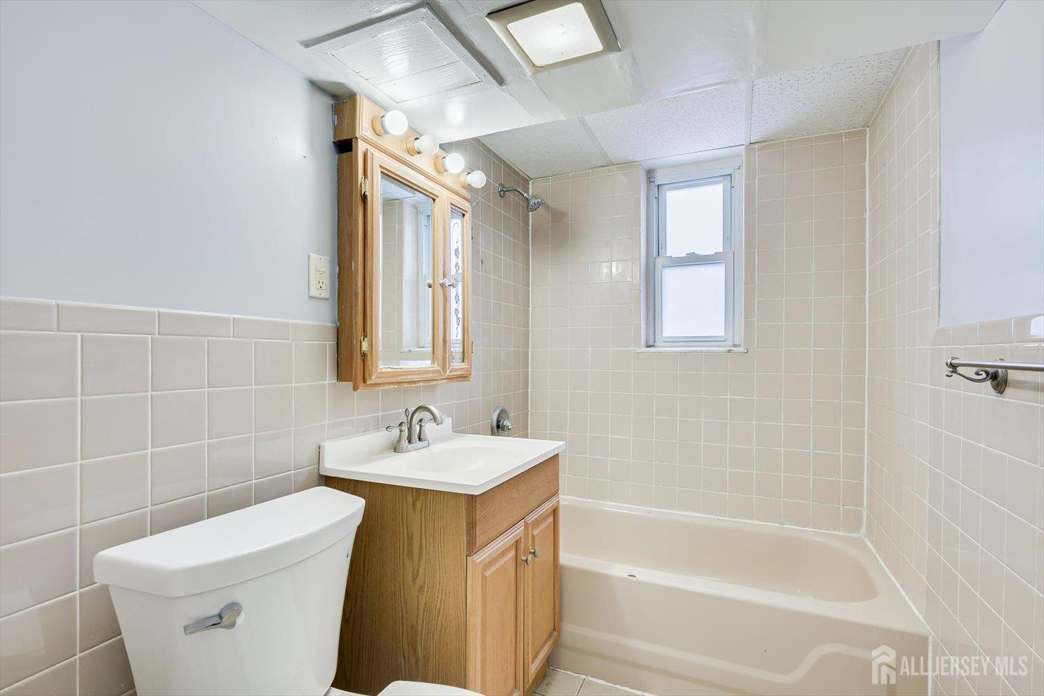 2 Garfield Park Edison, NJ 08837 - Photo 17 of 21 a bathroom with a sink toilet and shower
