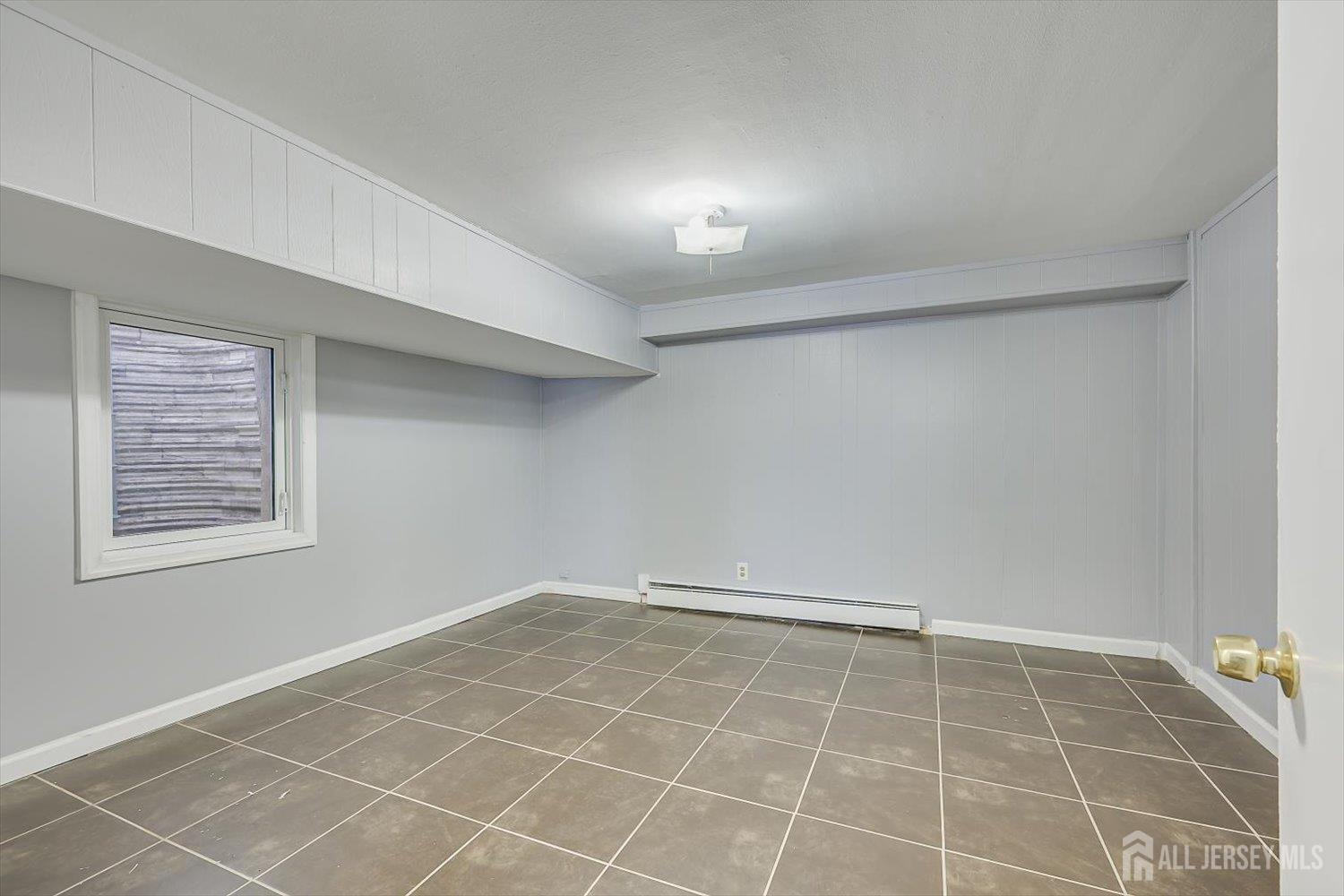 2 Garfield Park Edison, NJ 08837 - Photo 18 of 21 a view of an empty room with a window