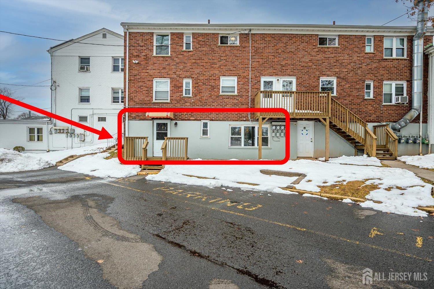 2 Garfield Park Edison, NJ 08837 - Photo 2 of 21 a front view of building with large windows