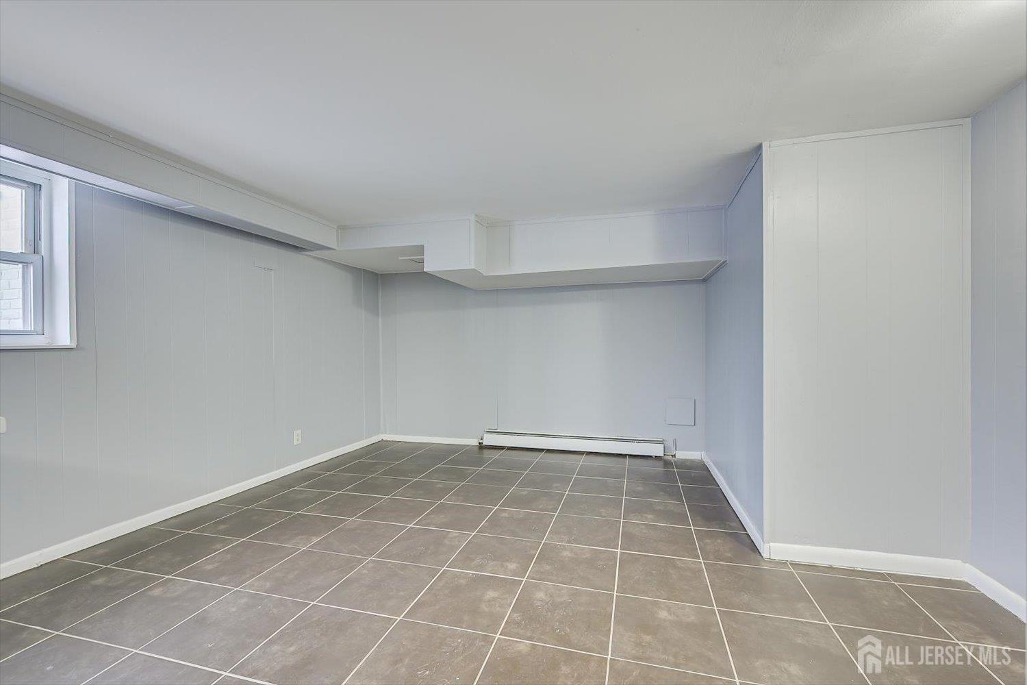 2 Garfield Park Edison, NJ 08837 - Photo 7 of 21 a view of an empty room with a window