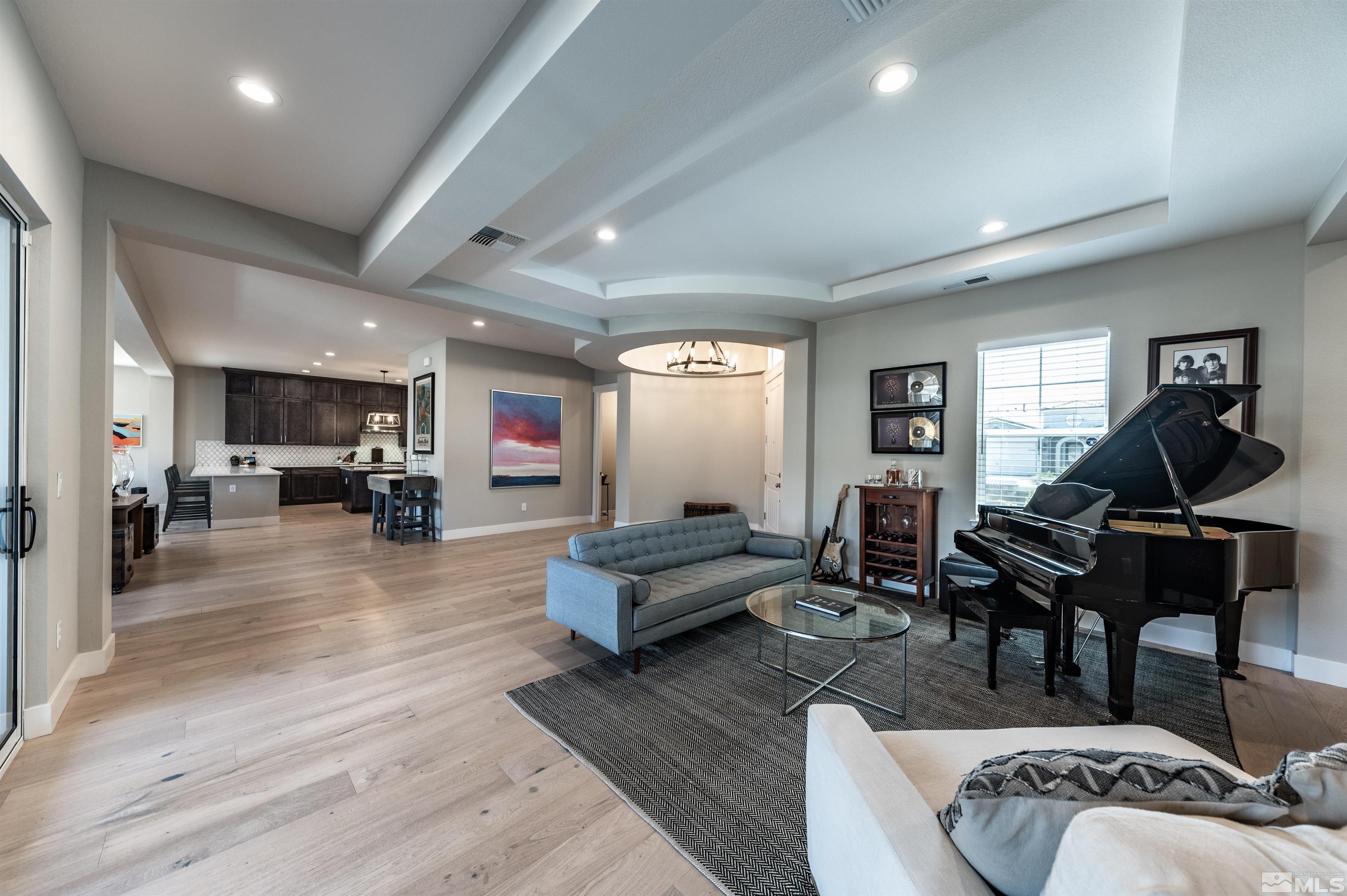 9604 Copperhorn Way Reno, NV 89521 - Photo 15 of 39 a living room with furniture rug and wooden floor