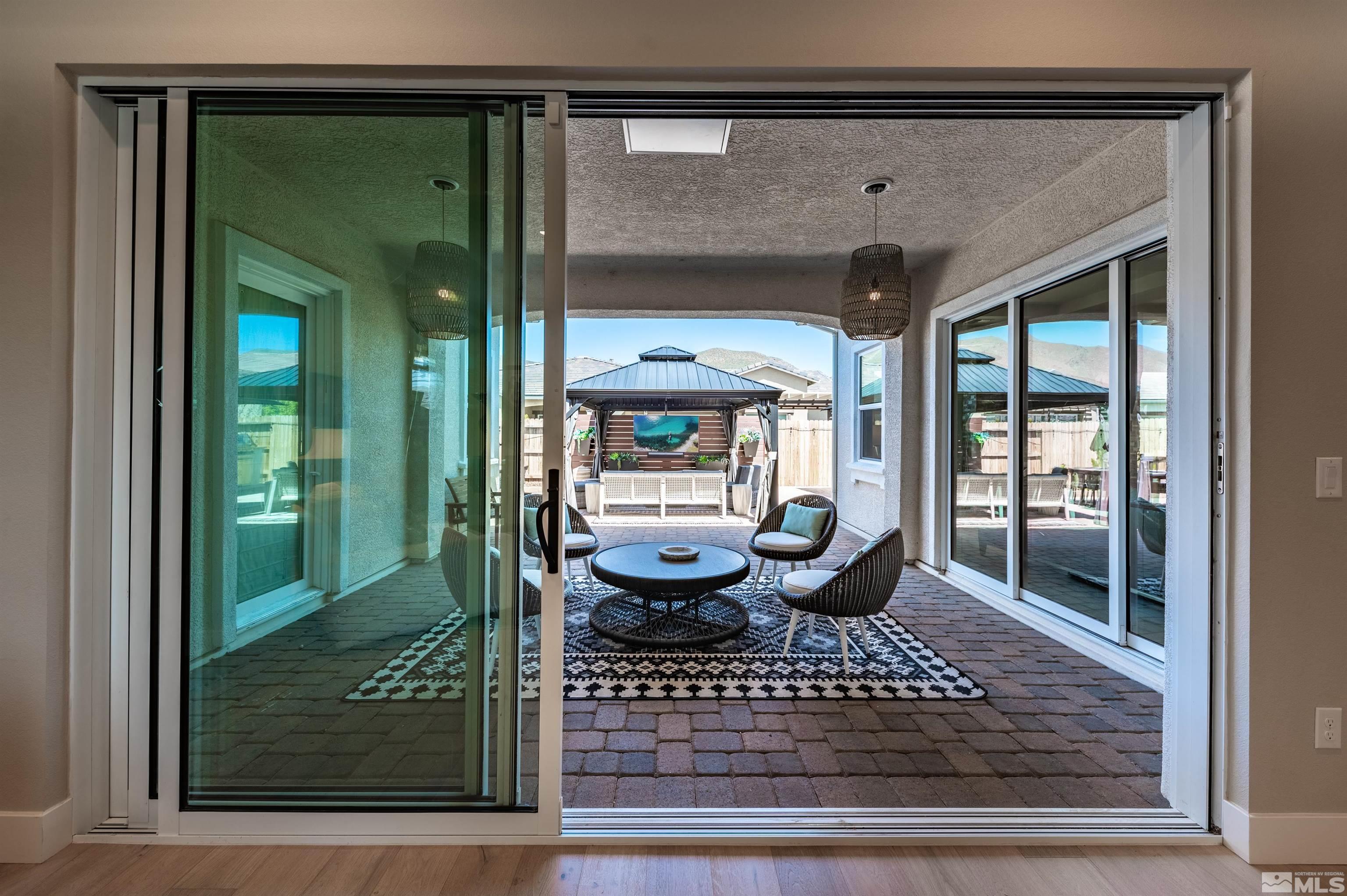 9604 Copperhorn Way Reno, NV 89521 - Photo 32 of 39 a view of a entryway door front of house