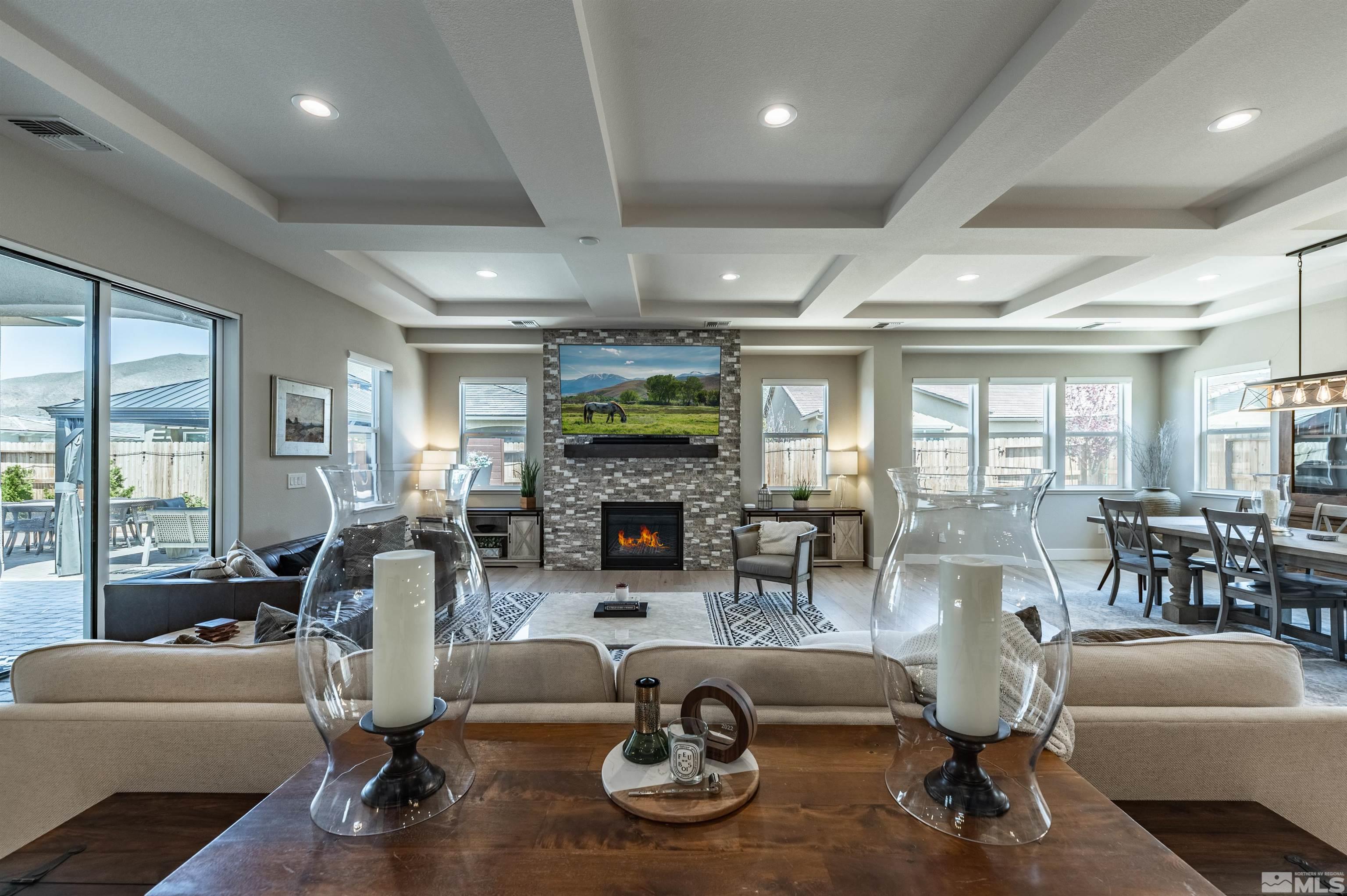 9604 Copperhorn Way Reno, NV 89521 - Photo 4 of 39 a living room with fireplace furniture and a large window