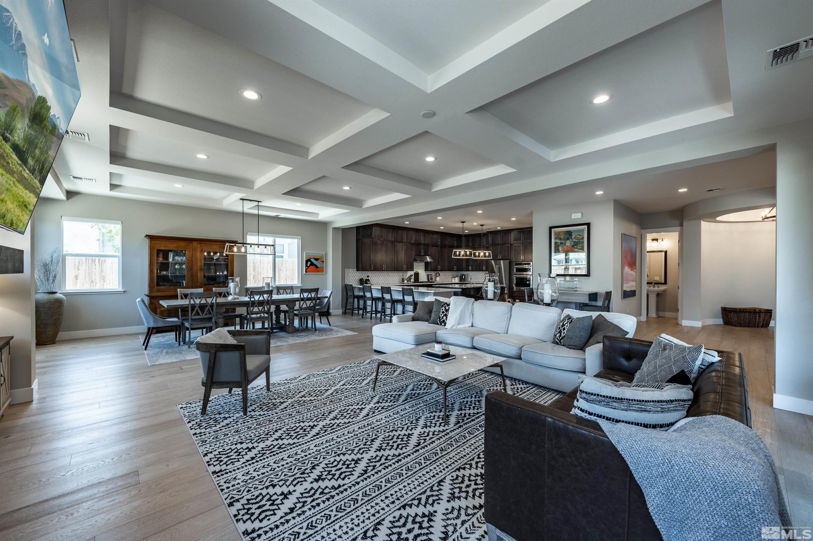 9604 Copperhorn Way Reno, NV 89521 - Photo 6 of 39 a living room with furniture and a flat screen tv