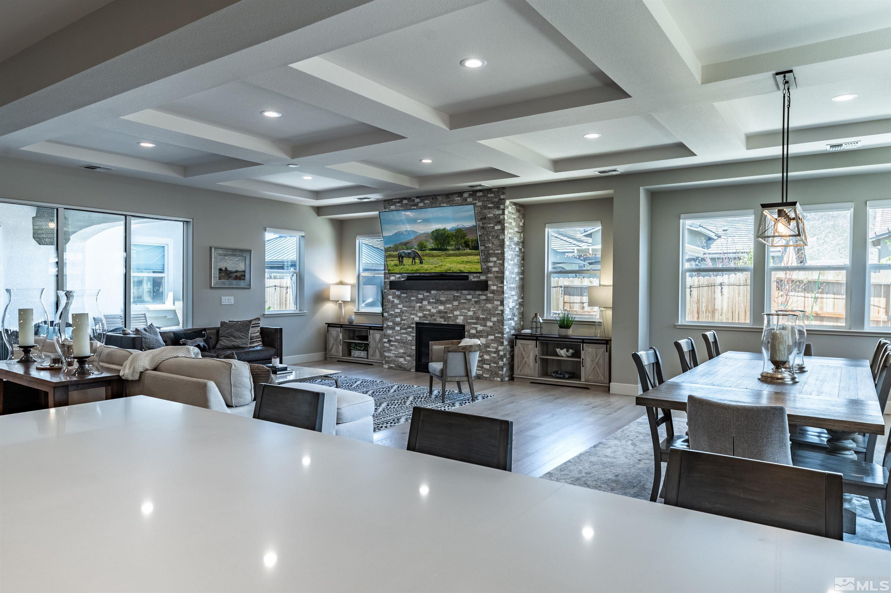 9604 Copperhorn Way Reno, NV 89521 - Photo 7 of 39 a living room with fireplace furniture and a large window