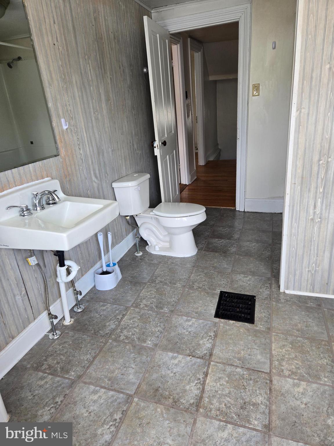 13177 Main Street Fort Loudon, PA 17224 - Photo 13 of 24 a bathroom with a sink a toilet and mirror