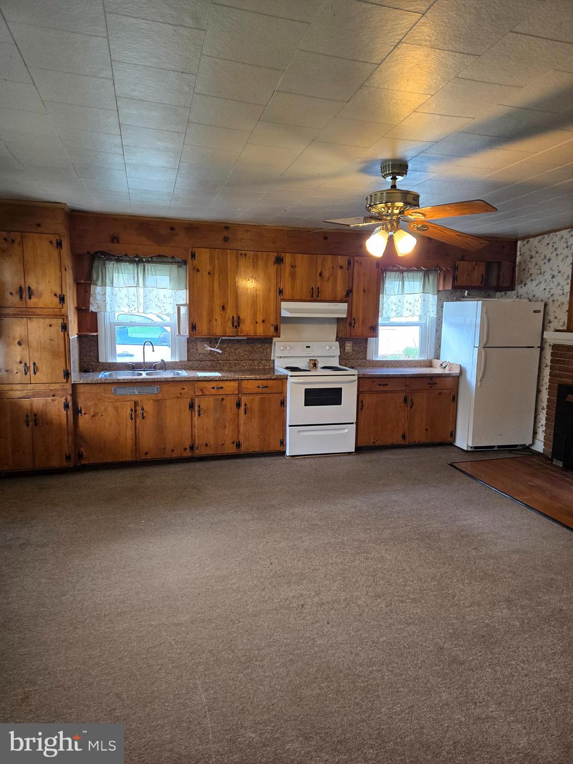 13177 Main Street Fort Loudon, PA 17224 - Photo 16 of 24 a view of a kitchen with a sink and a stove top oven