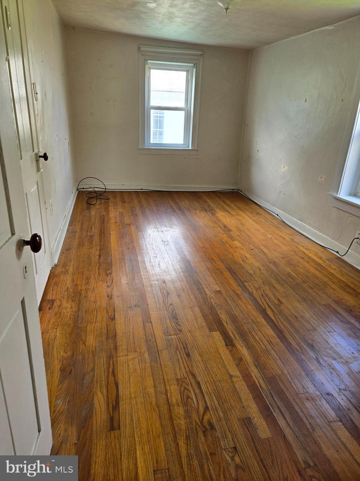 13177 Main Street Fort Loudon, PA 17224 - Photo 19 of 24 a view of a room with wooden floor and window