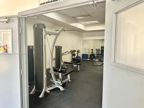 a view of a room with gym equipment