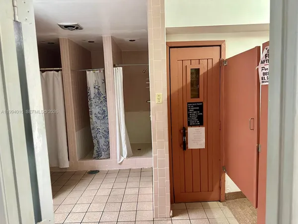 a view of swimming pool with outdoor seating