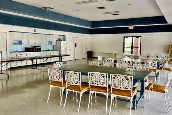 a living room with a couch and a window