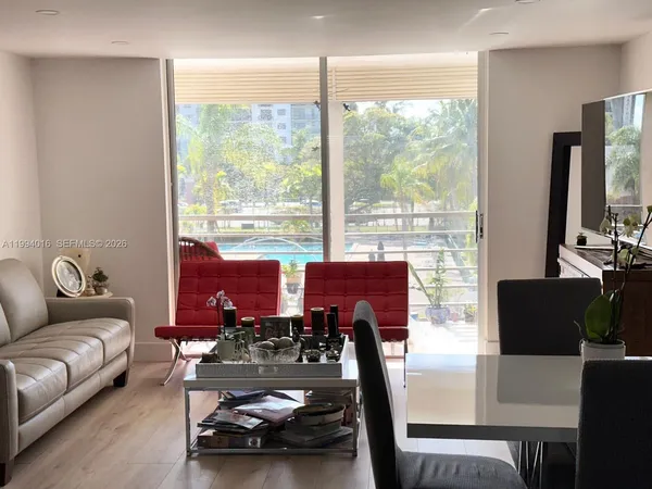 a view of a livingroom with furniture