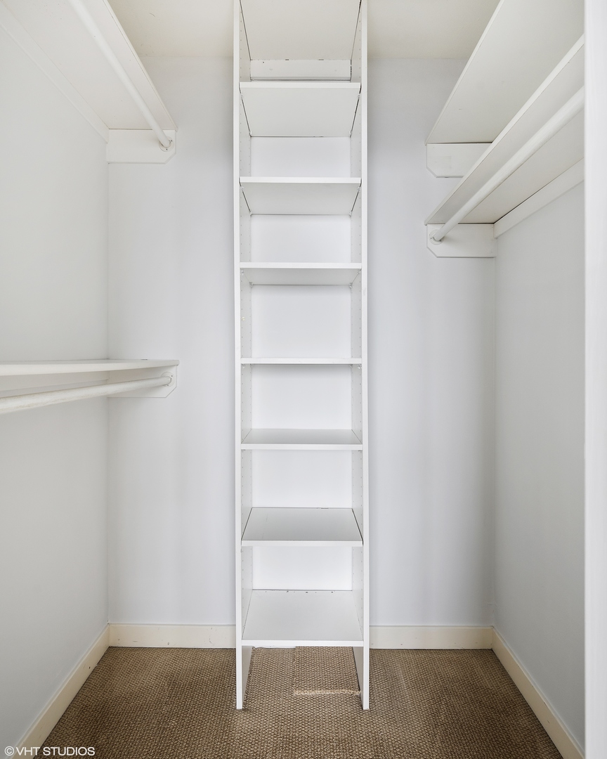 655 West Irving Park Road, Unit 5301 Chicago, IL 60613 - Photo 14 of 20 a view of an empty walk in closet