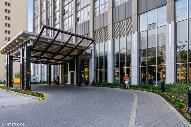 655 West Irving Park Road, Unit 5301 Chicago, IL 60613 - Photo 2 of 20 a view of a building with a porch