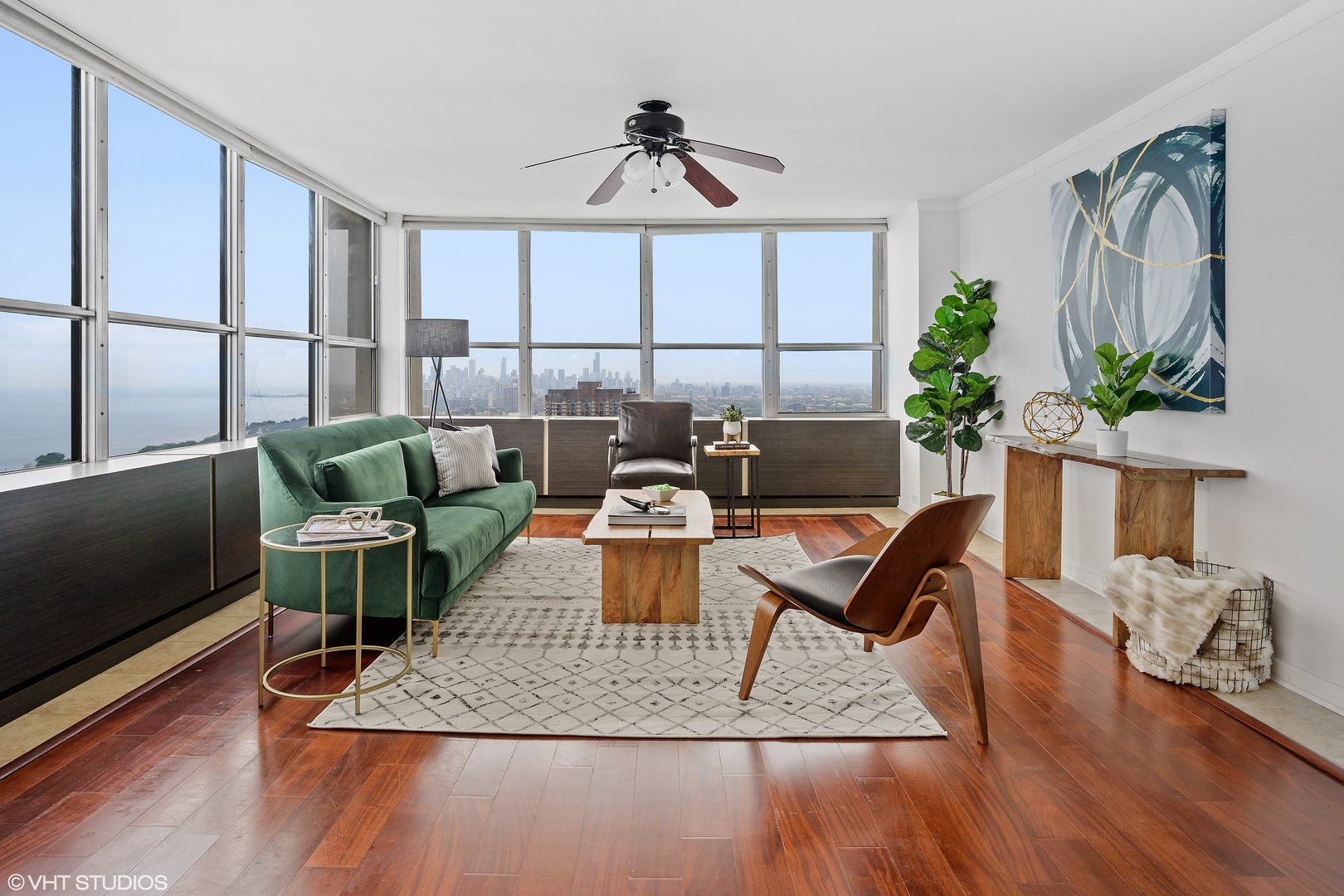 655 West Irving Park Road, Unit 5301 Chicago, IL 60613 - Photo 3 of 20 a living room with furniture rug and wooden floor