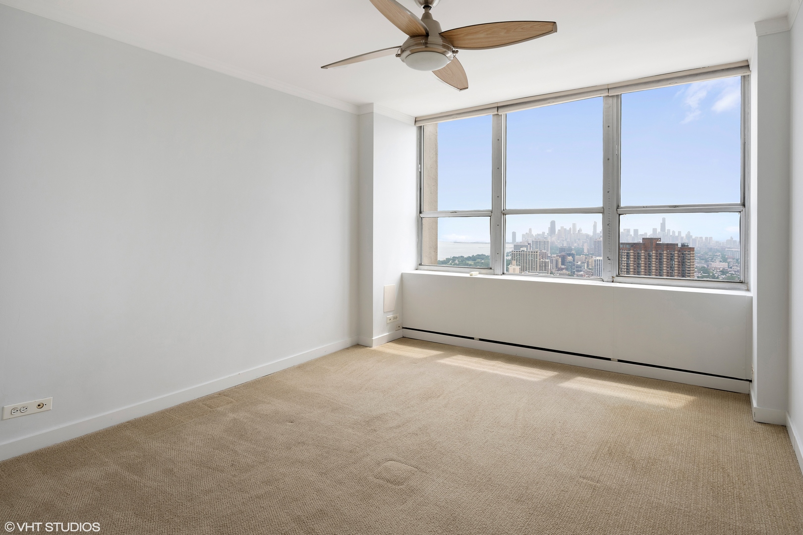 655 West Irving Park Road, Unit 5301 Chicago, IL 60613 - Photo 9 of 20 an empty room with a window