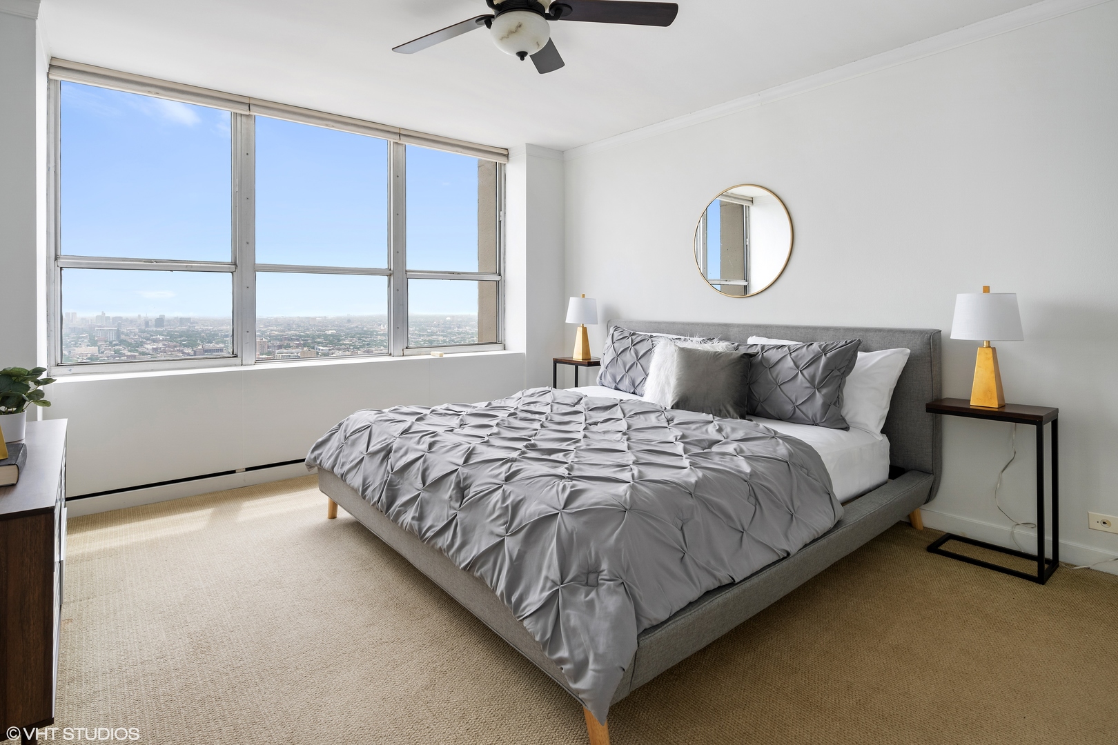 655 West Irving Park Road, Unit 5301 Chicago, IL 60613 - Photo 10 of 20 a bedroom with a bed and window