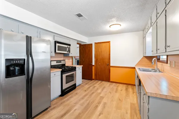 $224,900 | 5427 Forest Pines Drive, Lithonia, GA 30058