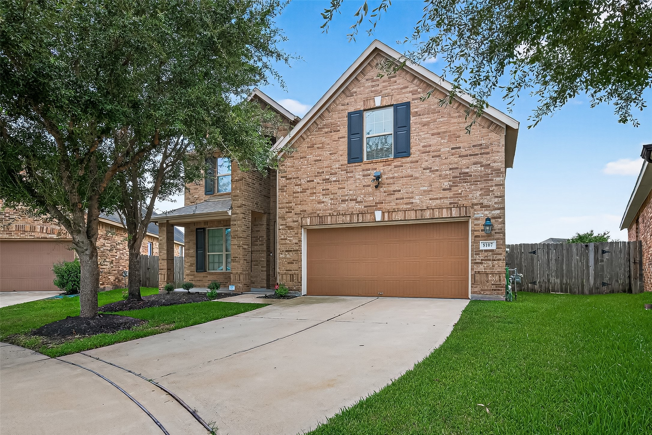 8107 Lockridge Terrace Lane Cypress, TX 77433 - Photo 3 of 50 A gorgeous, leafy tree provides wonderful shade and a sense of established beauty.