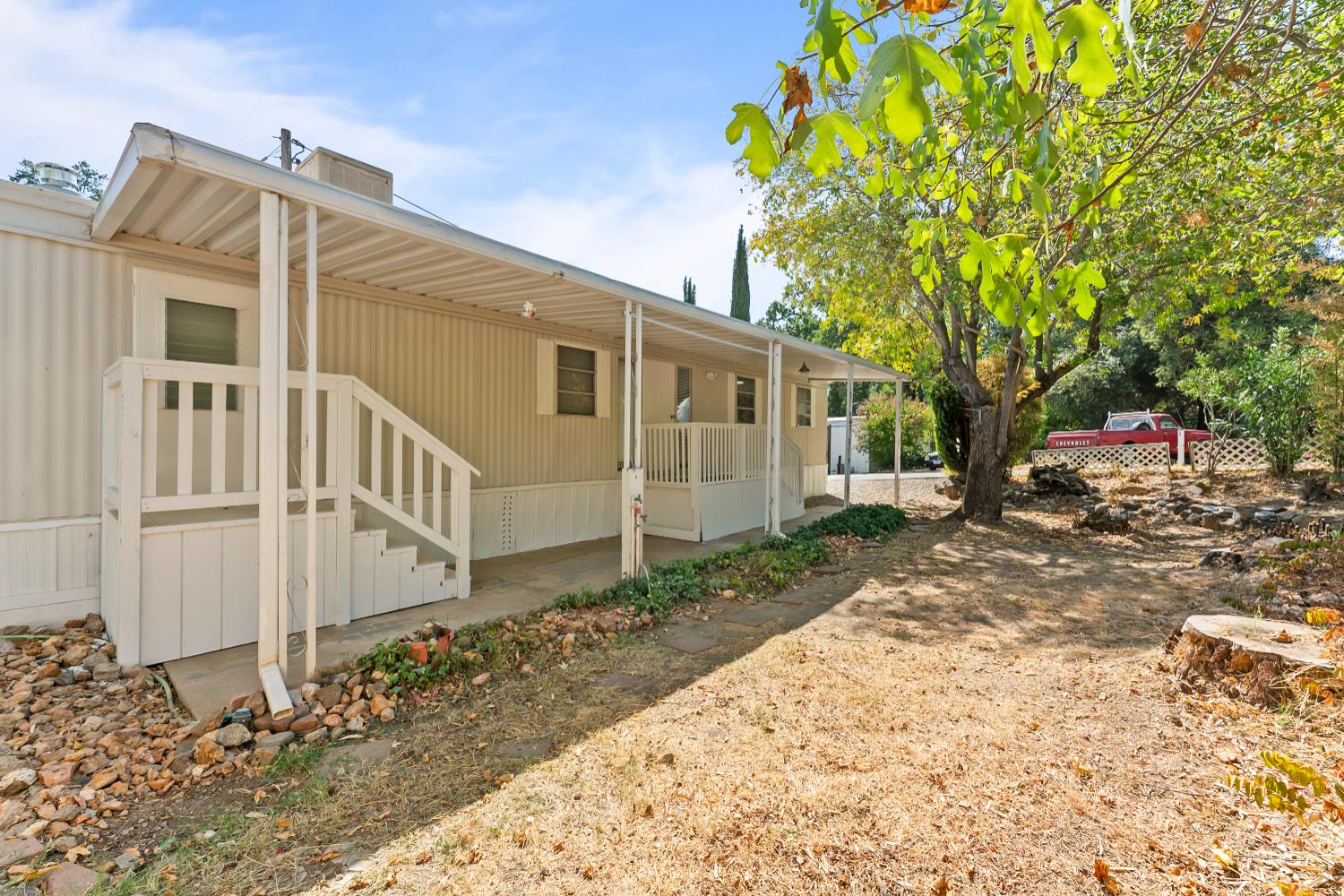 1525 Cold Springs Road, Unit 48 Placerville, CA 95667 - Photo 2 of 44 a view of a house with a yard
