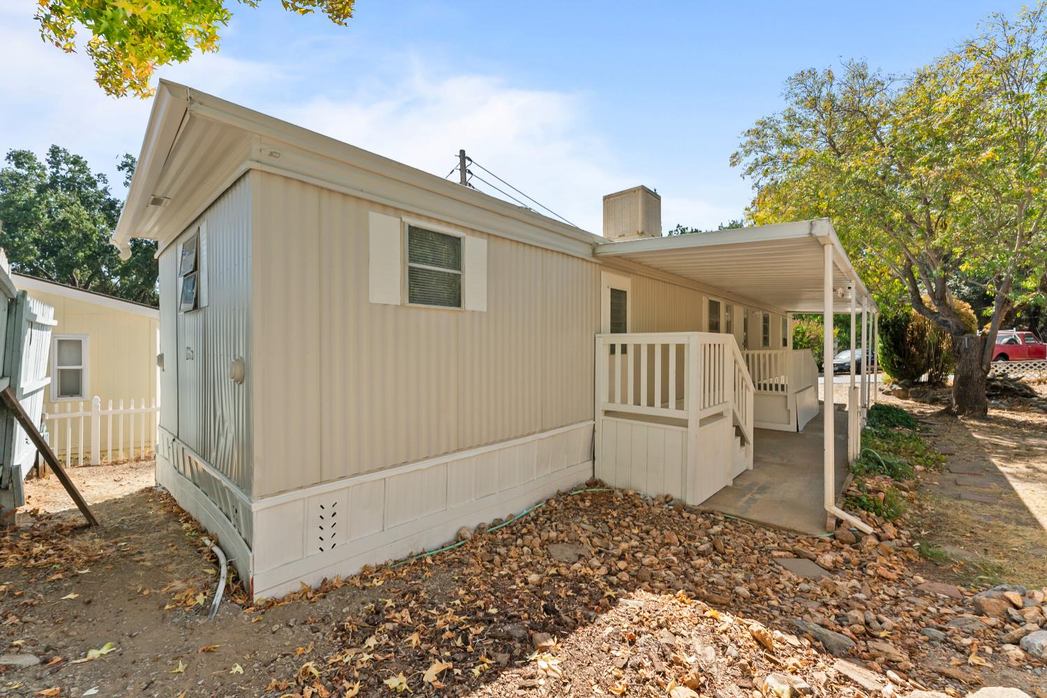 1525 Cold Springs Road, Unit 48 Placerville, CA 95667 - Photo 32 of 44 a view of a house with a fence