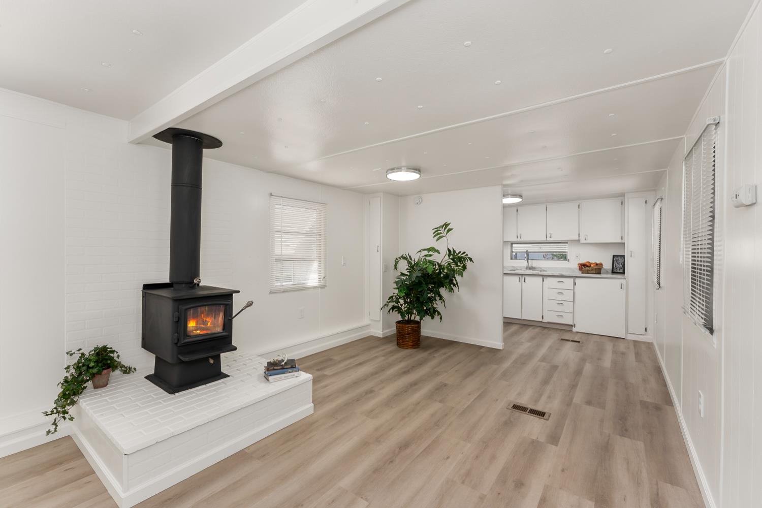 1525 Cold Springs Road, Unit 48 Placerville, CA 95667 - Photo 4 of 44 a living room with furniture and a fireplace